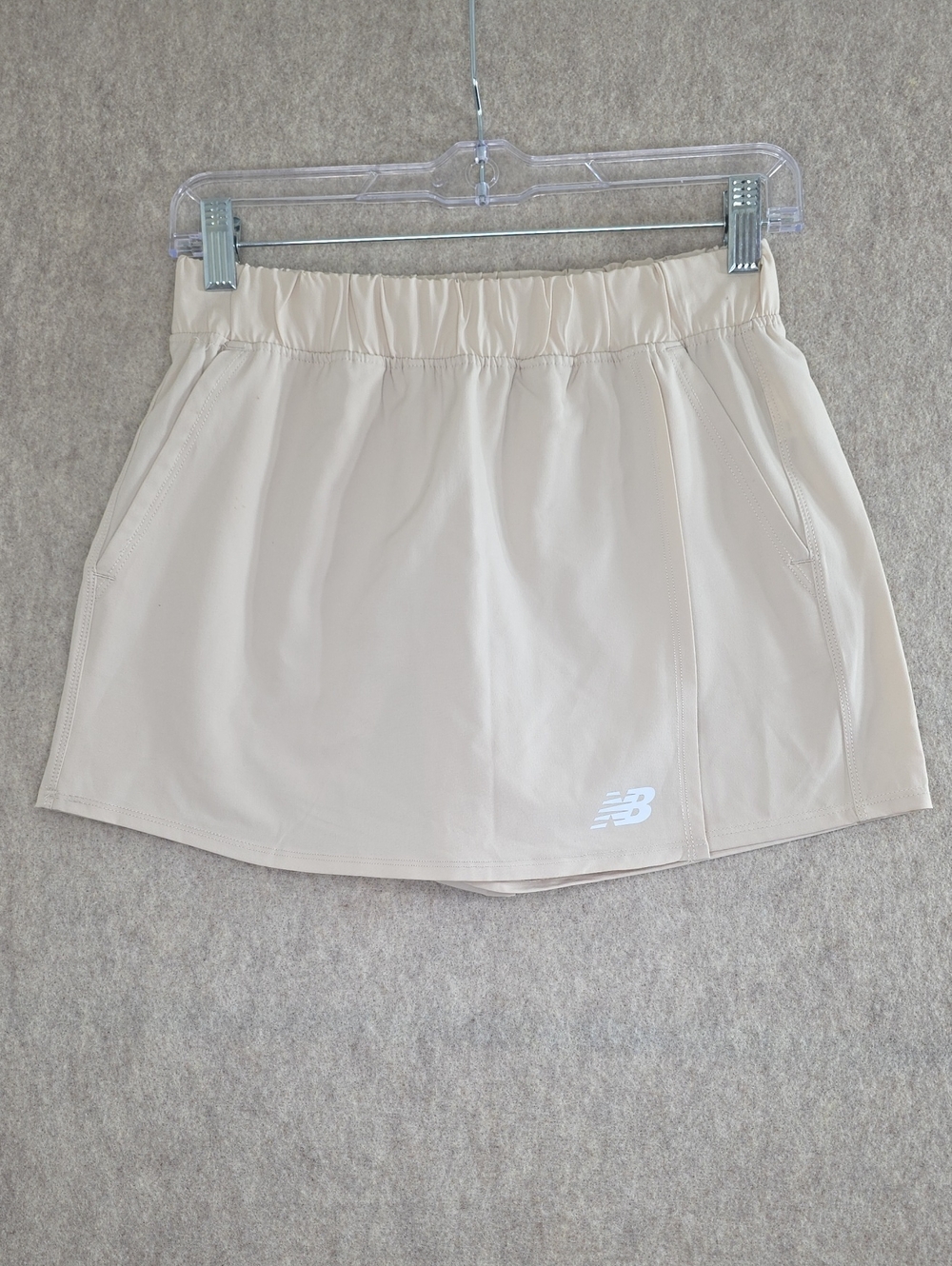 ​New Balance Active Skort with Pockets Cream color. Youth 14/16
